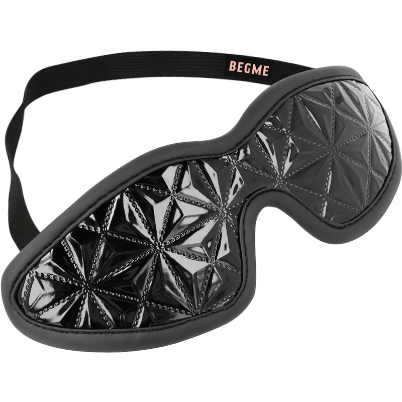 Antifaz negro Begme Black Edition con tira elástica y acabado acolchado brillante.