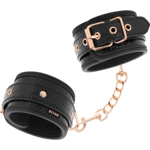 Tobilleras Begme Black Edition negras con cadena y detalles en oro rosa.