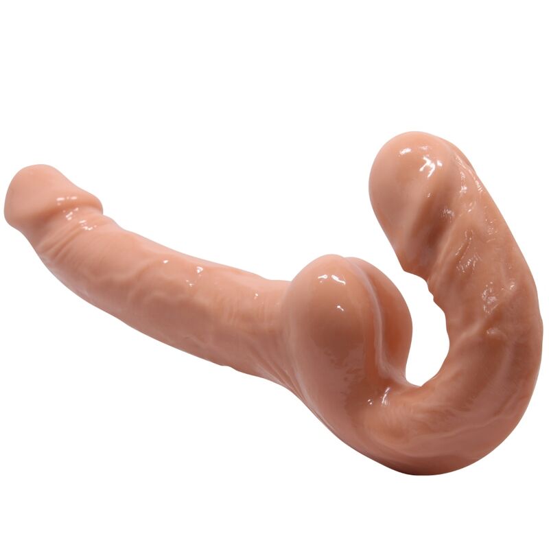 Dildo BAILE Harness Collection color carne, de forma curva y acabado brillante.