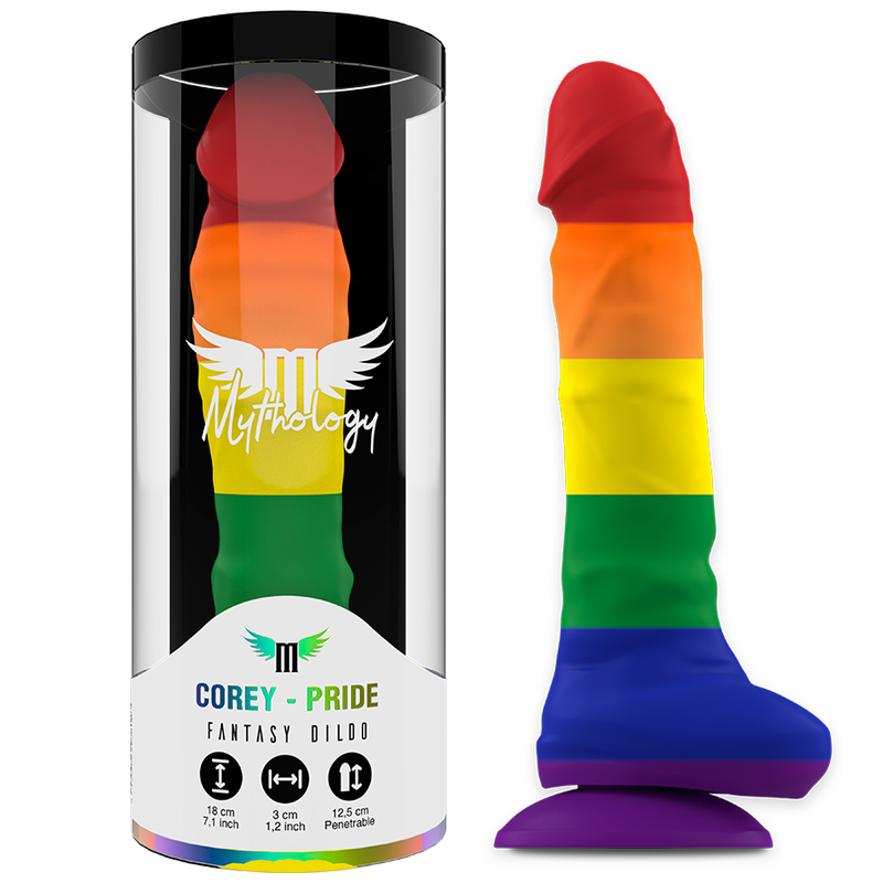Consolador MYTHOLOGY Corey Pride con base de succión, en colores arcoíris, junto a su caja del producto.