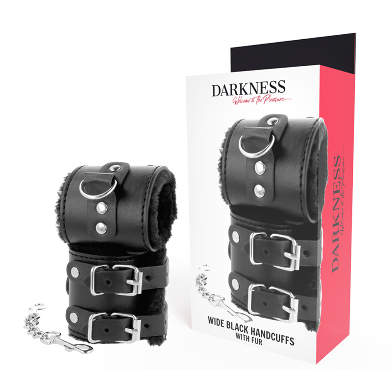 Esposas de muñeca Darkness Bondage negras con forro de pelo y hebillas metálicas, junto a la caja del producto.