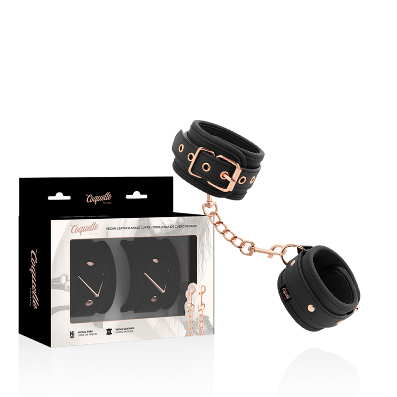 Esposas de tobillo Coquette Fantasy negras con cadena y caja del producto.