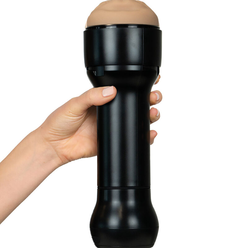 Detalle del Kiiroo PowerBlow: dispositivo negro de mano con parte superior color carne.