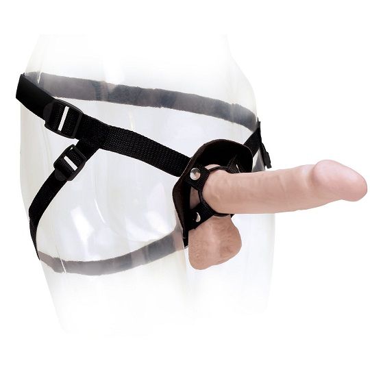 Arnés universal BASIX Rubber Works negro con dildo, visto de lado en un maniquí