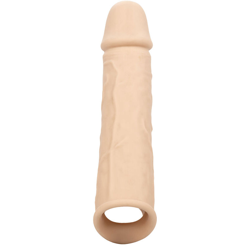Detalle de la extensión para pene CalExotics Performance Maxx en piel clara, vista frontal con abertura inferior visible.