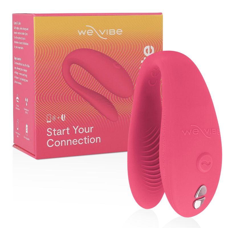 We-Vibe Sync Lite en rosa, con su caja del producto detrás.