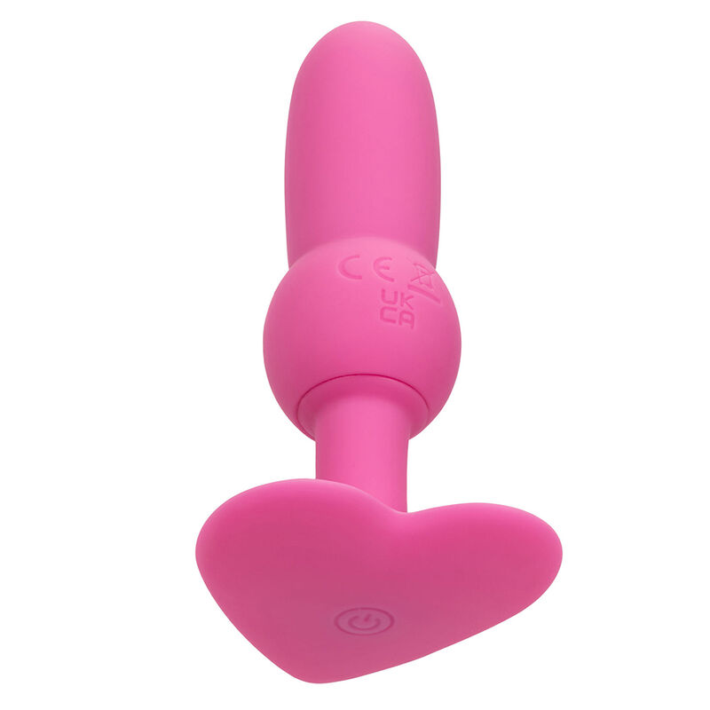 Detalle del plug anal vibrante rosa CalExotics con base en forma de corazón.
