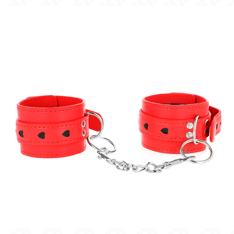 Esposas de muñeca KINK rojas con corazón negro y cadena metálica, vistas de frente.