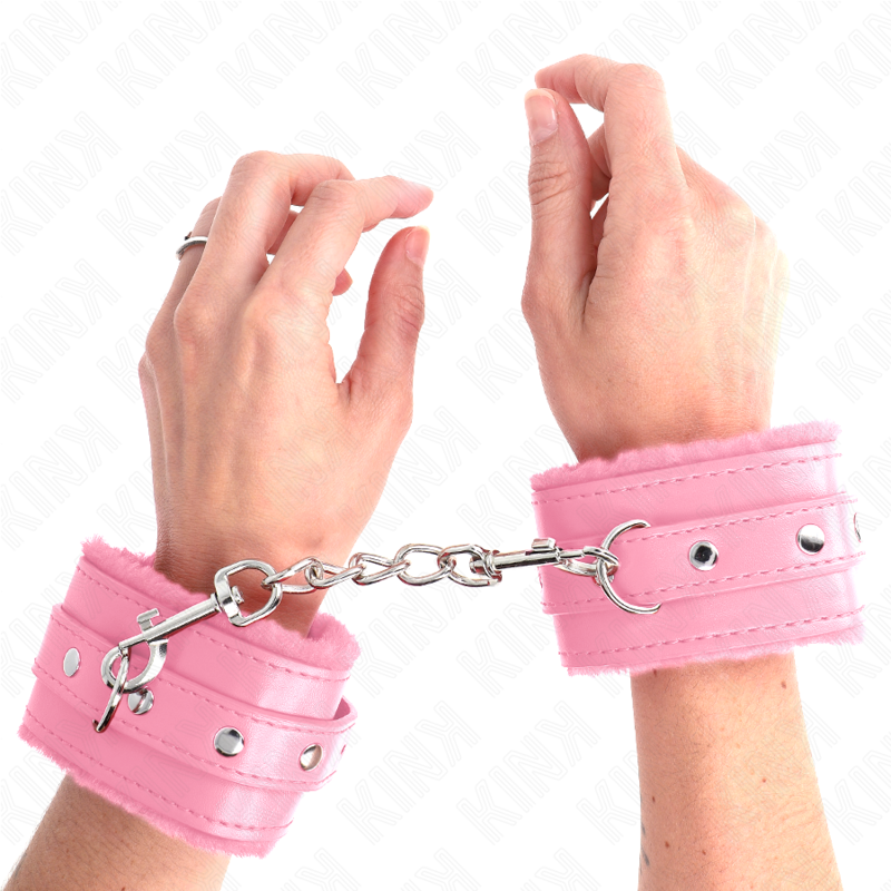 Esposas de muñeca KINK Premium rosas con forro de pelo y cadena metálica entre ambas muñecas.