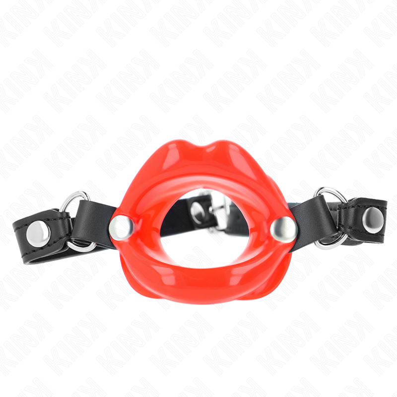 Mordaza labial Kink roja con correas negras y remaches metálicos, vista frontal.