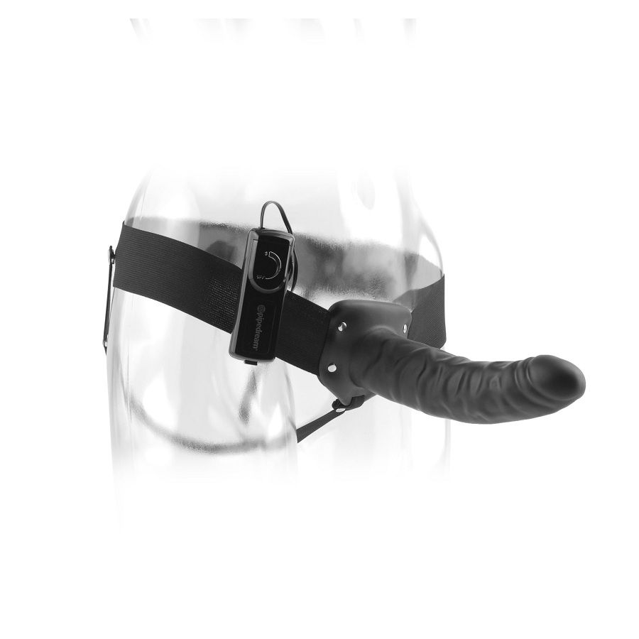 Arnés vibrador hueco negro FETISH FANTASY SERIES en vista lateral, con módulo de control y abertura visible.
