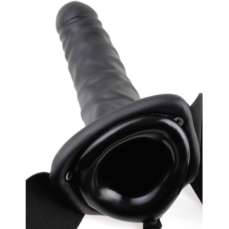 FETISH FANTASY SERIES arnés vibrador hueco negro en detalle, con base abierta y correas visibles.