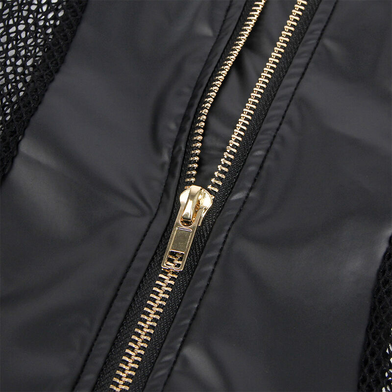 Detalle del vestido Subblime 954451 negro con cremallera dorada y malla visible.