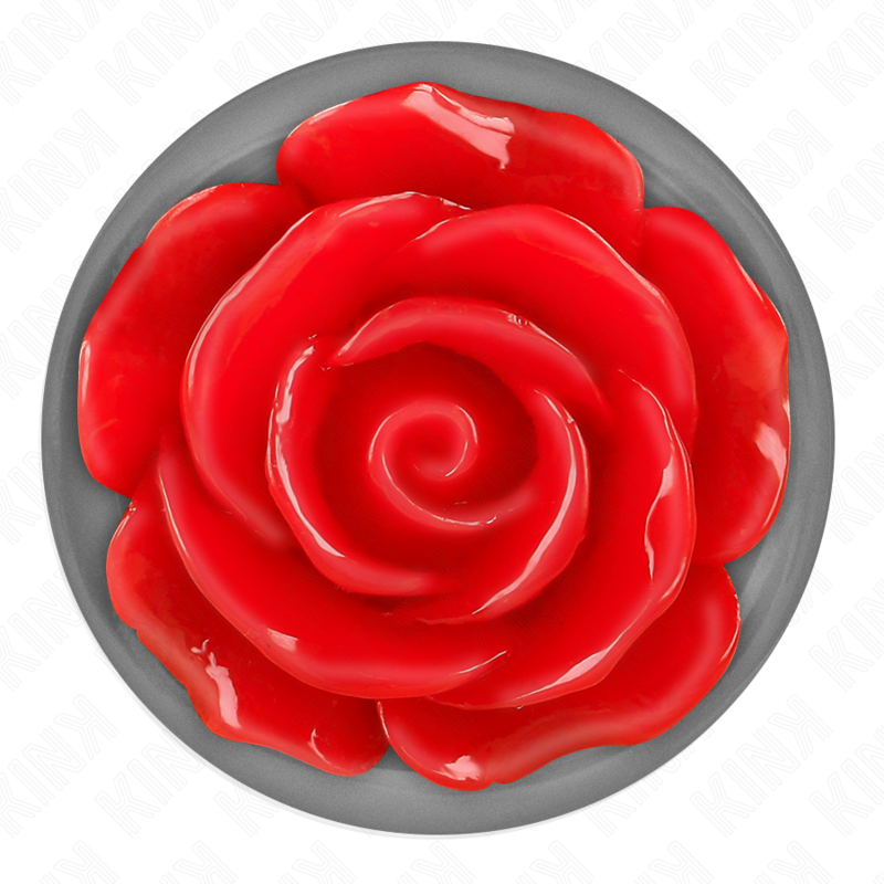 Detalle de KINK Pleasure Plugs con base rosa en forma de rosa roja.