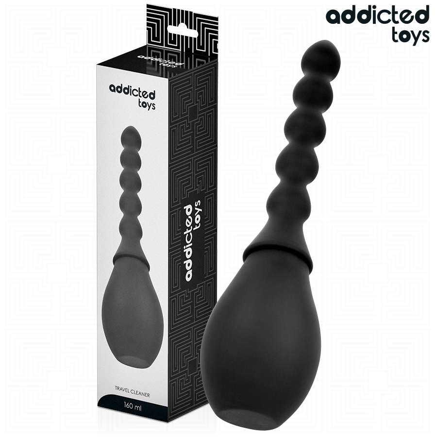 Limpiador de viaje de silicona Addicted Toys negro con caja del producto visible.