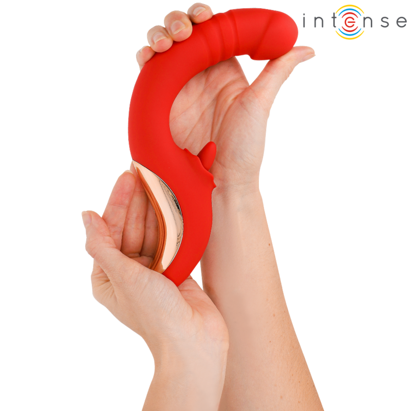 Vibrador en U rojo Intense High Tech Paulina sujetado con las manos.