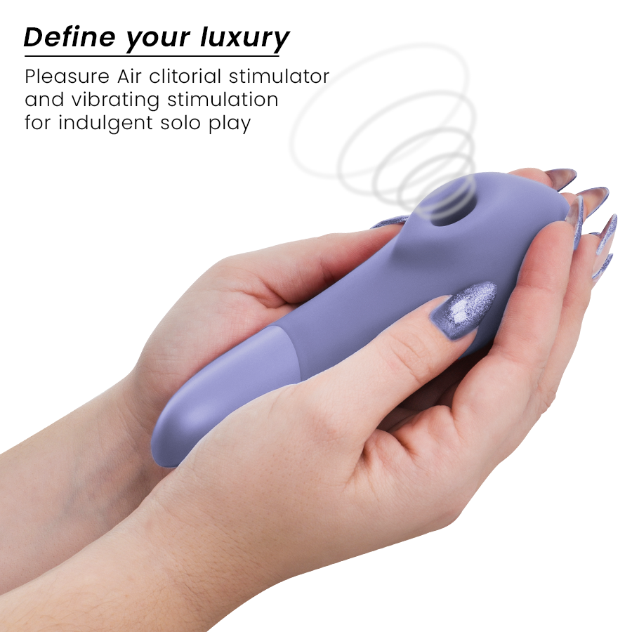Womanizer Enhance lila en las manos, con texto promocional sobre Pleasure Air y vibración.