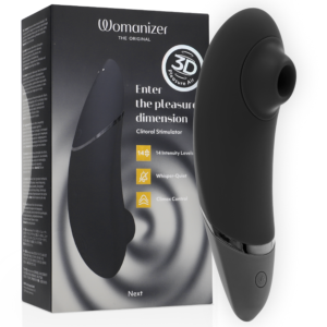Womanizer NEXT negro con su caja del producto, en vista frontal angular.