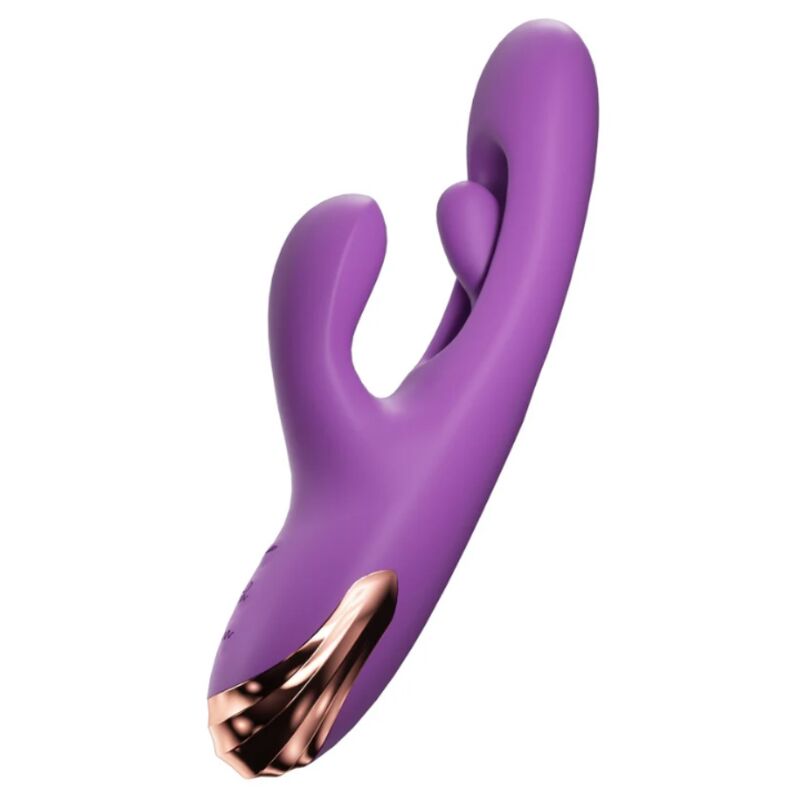 Vibrador rabbit She.E.O morado en vista frontal con detalle metálico rosa dorado.