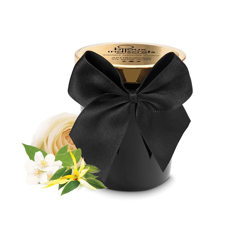 Vela de masaje Bijoux Melt My Heart Aphrodisia en tarro negro con lazo negro y tapa dorada.