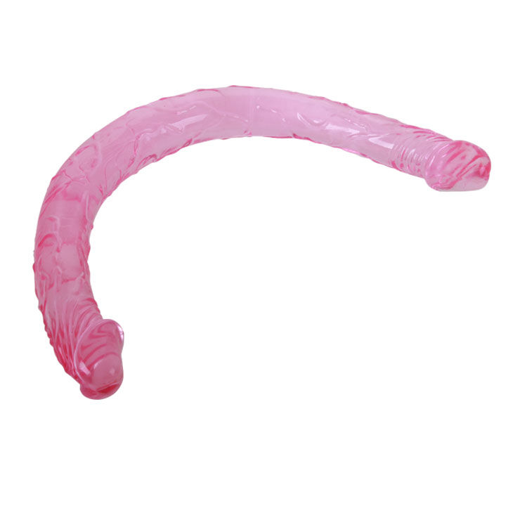 Detalle del BAILE ANAL Double Dong rosa, con forma curva y dos puntas redondeadas.