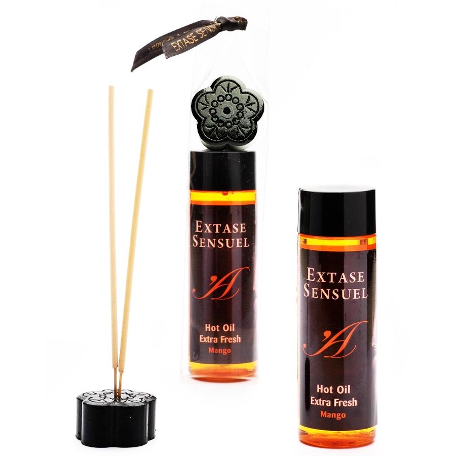 EXTASE SENSUAL aceite estimulante de mango, con dos botellas y varillas decorativas.
