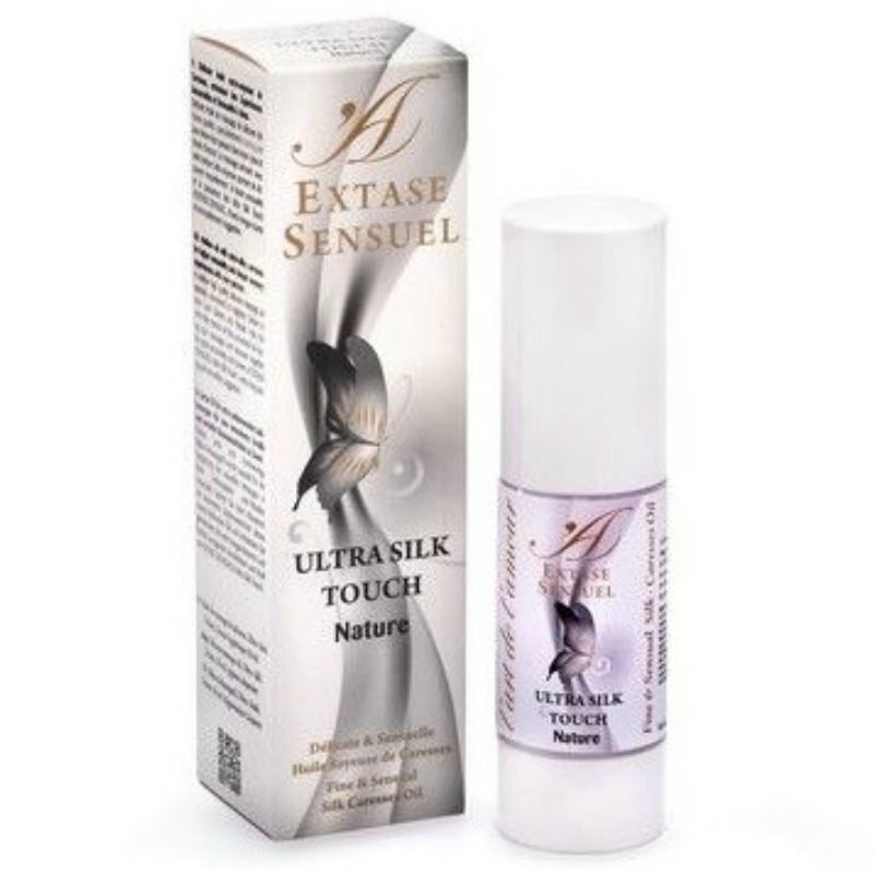 Aceite de masaje EXTASE SENSUAL Ultra Silk Touch Nature con caja y envase lila.
