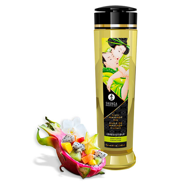 Shunga Irresistible aceite de masaje erótico en botella transparente con frutas de dragón al lado.