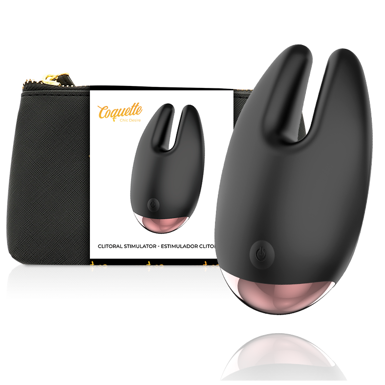 Coquette Toys Coquette Chic Desire en negro, con base rosa translúcida y caja del producto al fondo.